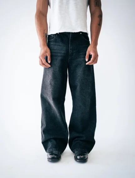 The Uniforum Wide Leg Denim Jeans are made from heavyweight (15.2oz) 100% organic cotton in a light blue wash with faded distressing